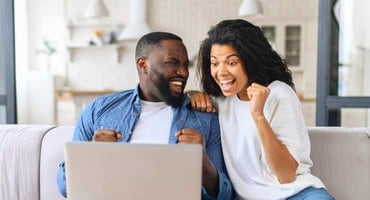 Couple celebrating their earnings