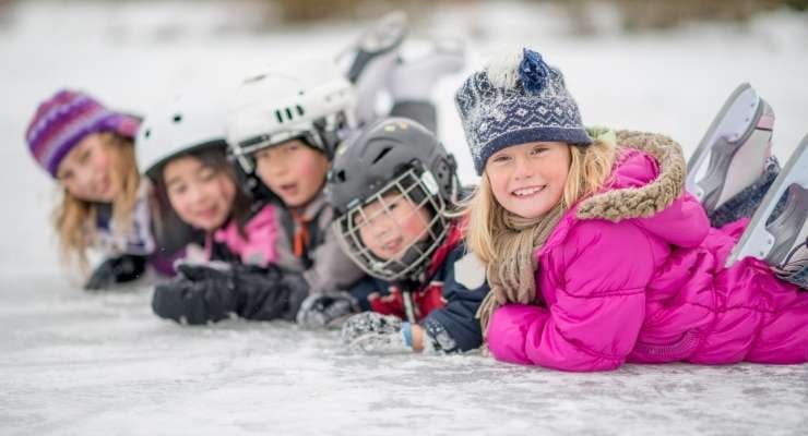 Group of kids playing on the ice