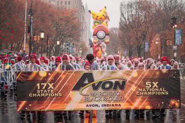 avon marching black and gold performing at the 2024 macy's thanksgiving day parade