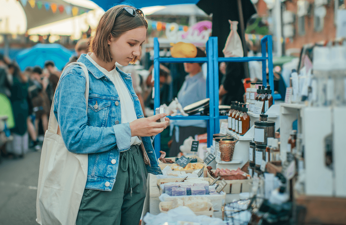 young woman shopping at a craft fair fundraiser