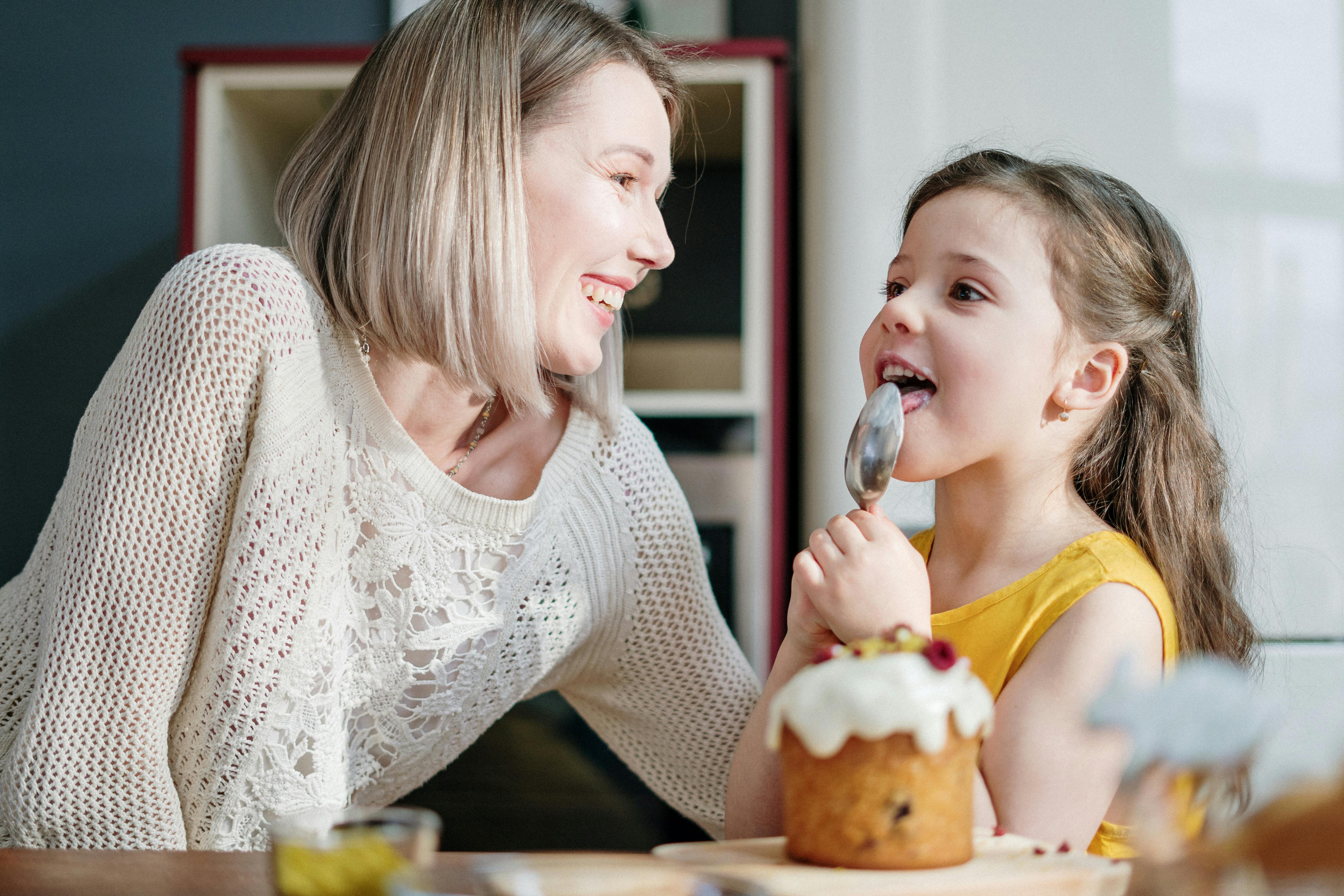 mother and daughter baking together