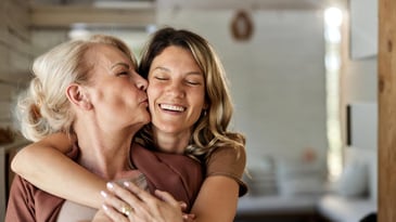 mom and daughter hugging on mother's day