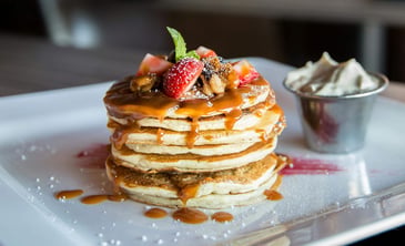 a stack of pancakes for a pancake breakfast fundraiser