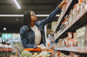 woman shopping for groceries in a store