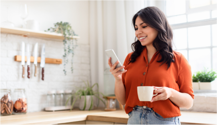 woman checking her phone for fundraising updates